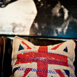 coastal haven design | coastalhavendesign.com | room styling details: horse painting and flag pillow